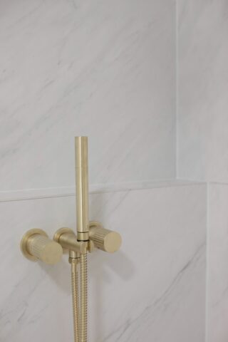 Harbourside apartment renovation brass shower mixer